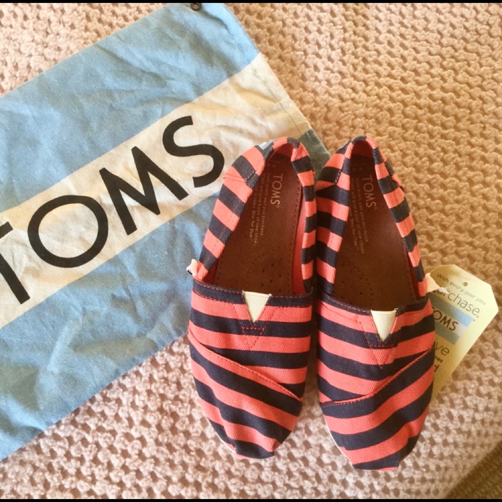 TOMS pink chambrey stripe youth classic shoes